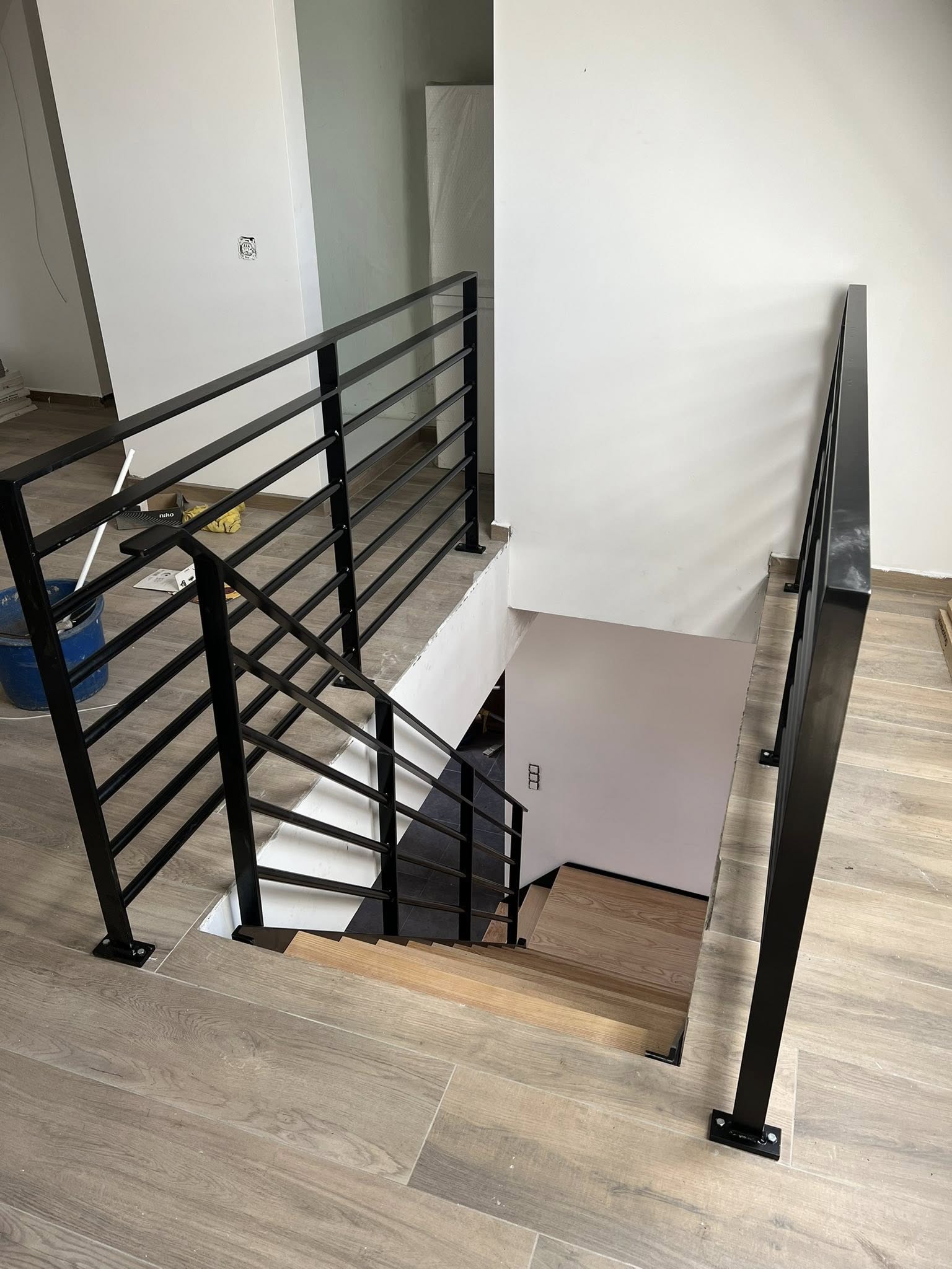 Escalier quart tournant et trémie